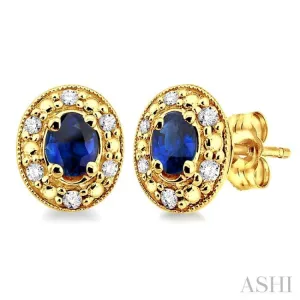 4x3mm Oval Shaped Sapphire and 1/10 Ctw Single Cut Diamond Earrings in 14K Yellow Gold